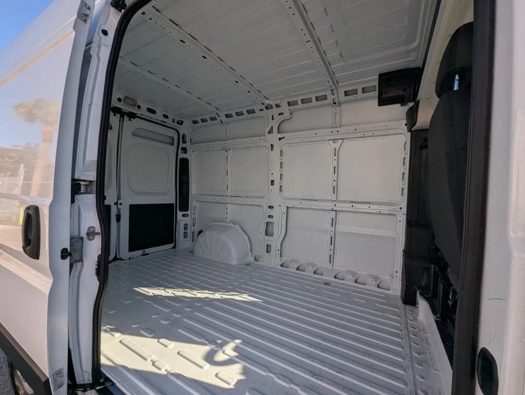 Ram ProMaster Cargo Van Tradesman 3500 High Roof 136" WB w/Pass Seat 2026 — side view