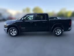 Ram 1500 Big Horn 4x4 Crew Cab 5'7" Box 2026 — side view
