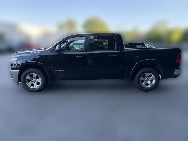 Ram 1500 Big Horn 4x4 Crew Cab 5'7" Box 2026 — side view