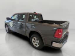 Ram 1500 Big Horn 4x4 Crew Cab 5'7" Box 2026 — side view