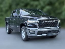Ram 1500 Big Horn 4x4 Crew Cab 5'7" Box 2026 — side view