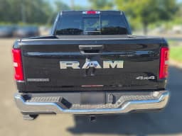 Ram 1500 Big Horn 4x4 Crew Cab 5'7" Box 2026 — side view
