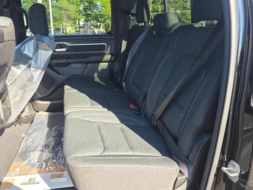 Ram 1500 Big Horn 4x4 Crew Cab 5'7" Box 2026 — side view