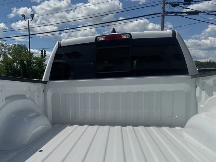 Ram 1500 Express 4x4 Crew Cab 5'7" Box 2026 — side view