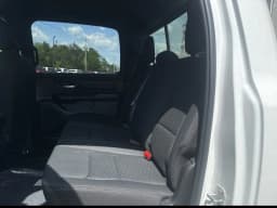Ram 1500 Express 4x4 Crew Cab 5'7" Box 2026 — side view
