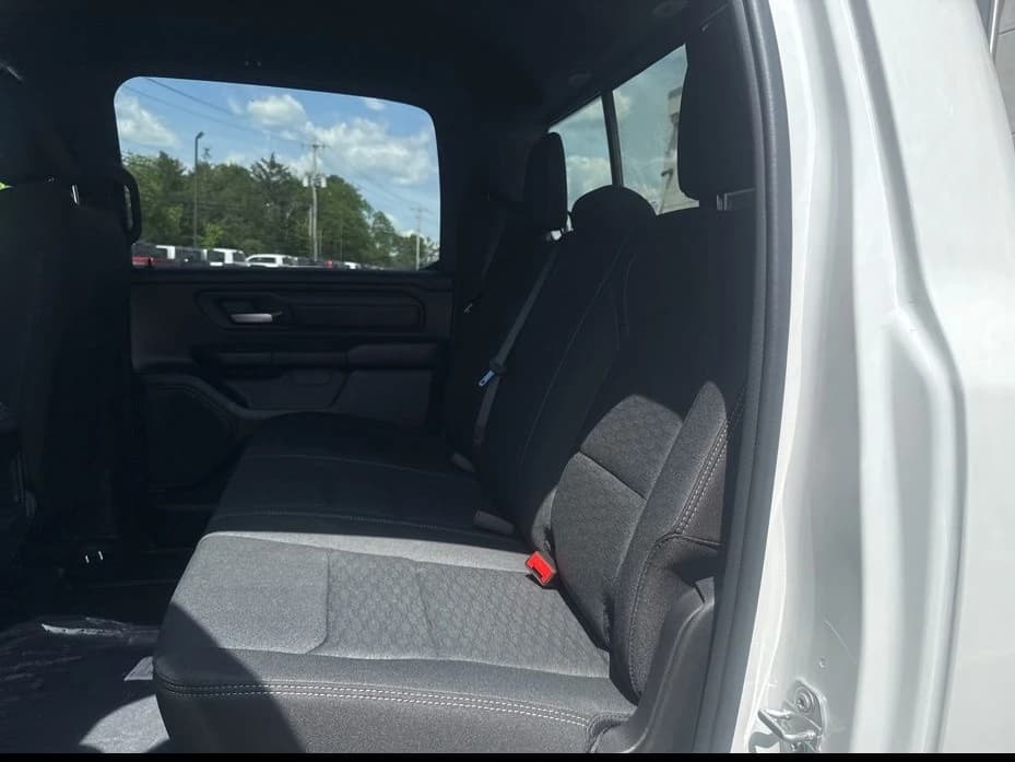 Ram 1500 Express 4x4 Crew Cab 5'7" Box 2026 — side view
