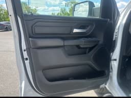 Ram 1500 Express 4x4 Crew Cab 5'7" Box 2026 — side view