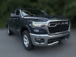 Ram 1500 Big Horn 4x4 Crew Cab 5'7" Box 2026 — side view