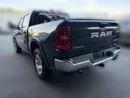Ram 1500 Big Horn 4x4 Crew Cab 5'7" Box 2026 — side view
