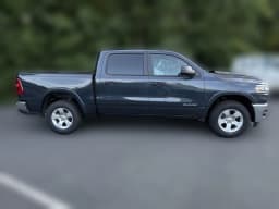 Ram 1500 Big Horn 4x4 Crew Cab 5'7" Box 2026 — side view