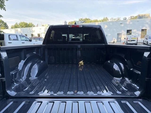 Ram 1500 Big Horn 4x4 Crew Cab 5'7" Box 2026 — side view