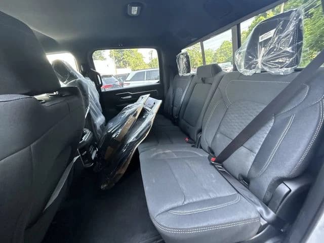 Ram 1500 Big Horn 4x4 Crew Cab 5'7" Box 2026 — side view