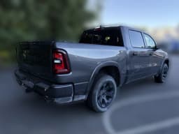 Ram 1500 Big Horn 4x4 Crew Cab 5'7" Box 2026 — side view