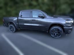 Ram 1500 Big Horn 4x4 Crew Cab 5'7" Box 2026 — side view