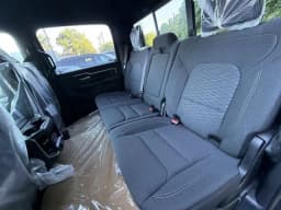 Ram 1500 Big Horn 4x4 Crew Cab 5'7" Box 2026 — side view