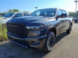 Ram 1500 Big Horn 4x4 Crew Cab 5'7" Box 2026 — side view