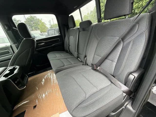 Ram 1500 Big Horn 4x4 Crew Cab 5'7" Box 2026 — side view
