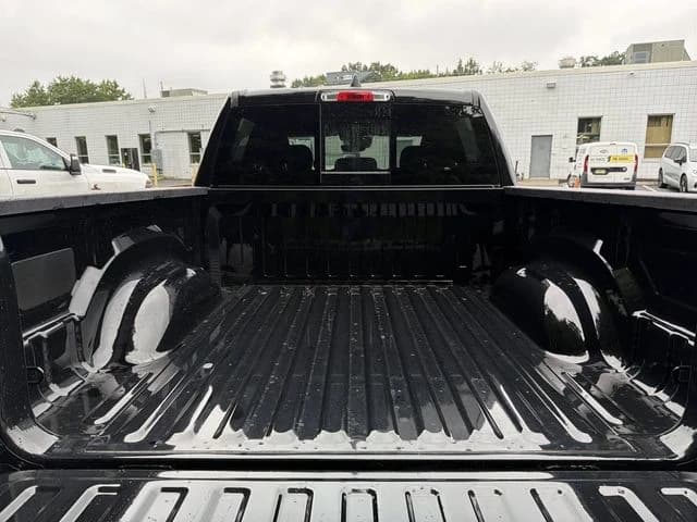 Ram 1500 Big Horn 4x4 Crew Cab 5'7" Box 2026 — side view