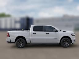 Ram 1500 Big Horn 4x4 Crew Cab 5'7" Box 2026 — side view