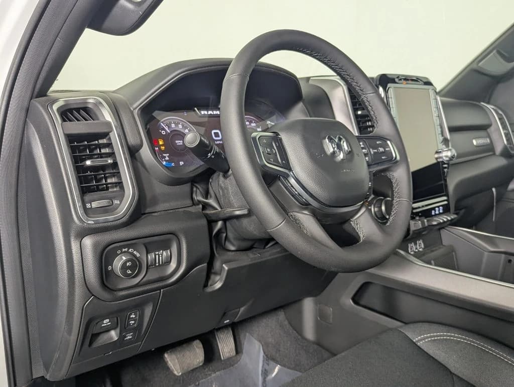 Ram 1500 Big Horn 4x4 Crew Cab 5'7" Box 2026 — side view