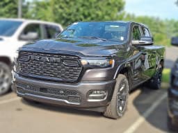 Ram 1500 Big Horn 4x4 Crew Cab 5'7" Box 2026 — side view