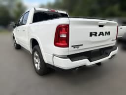 Ram 1500 Big Horn 4x4 Crew Cab 5'7" Box 2026 — side view