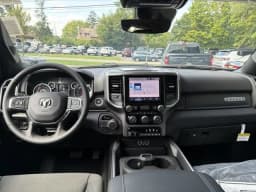 Ram 1500 Big Horn 4x4 Crew Cab 5'7" Box 2026 — side view