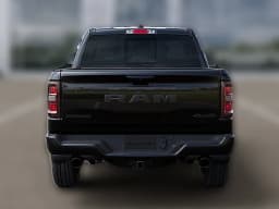 Ram 1500 Big Horn 4x4 Crew Cab 5'7" Box 2026 — side view