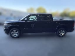 Ram 1500 Big Horn 4x4 Crew Cab 5'7" Box 2026 — side view