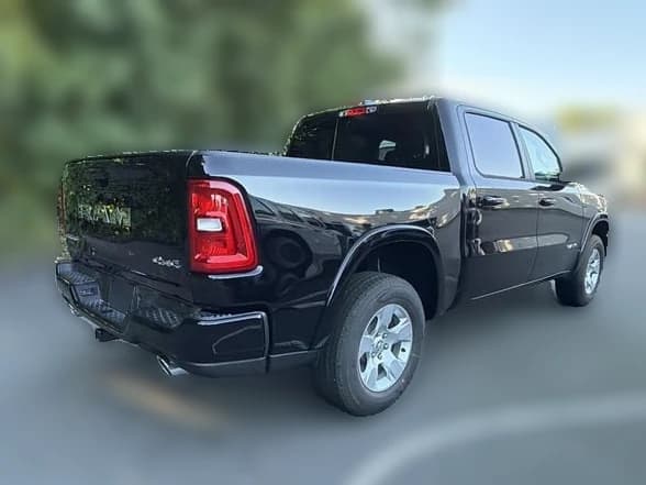 Ram 1500 Big Horn 4x4 Crew Cab 5'7" Box 2026 — side view
