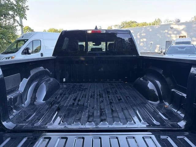 Ram 1500 Big Horn 4x4 Crew Cab 5'7" Box 2026 — side view