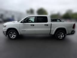 Ram 1500 Big Horn 4x4 Crew Cab 5'7" Box 2026 — side view