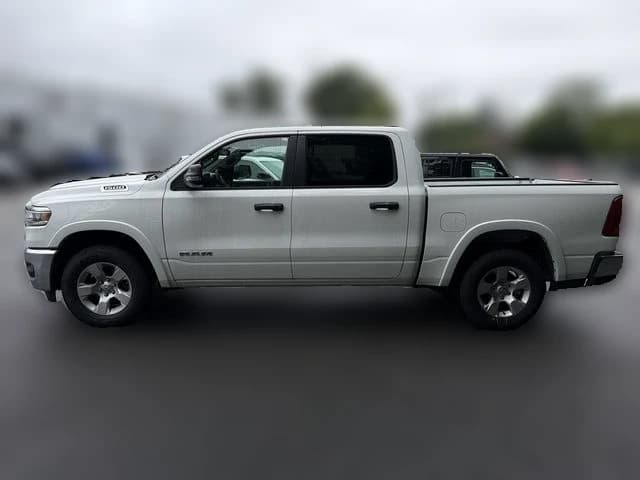 Ram 1500 Big Horn 4x4 Crew Cab 5'7" Box 2026 — side view