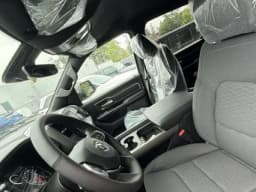 Ram 1500 Big Horn 4x4 Crew Cab 5'7" Box 2026 — side view