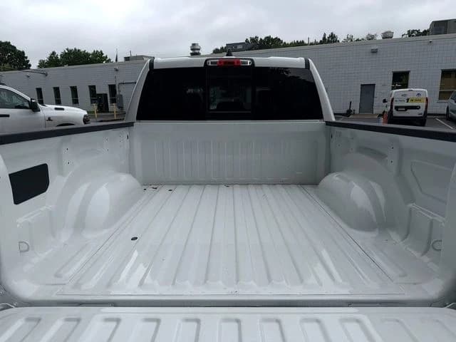 Ram 1500 Big Horn 4x4 Crew Cab 5'7" Box 2026 — side view
