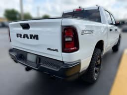 Ram 1500 Warlock 4x4 Crew Cab 5'7" Box 2026 — side view