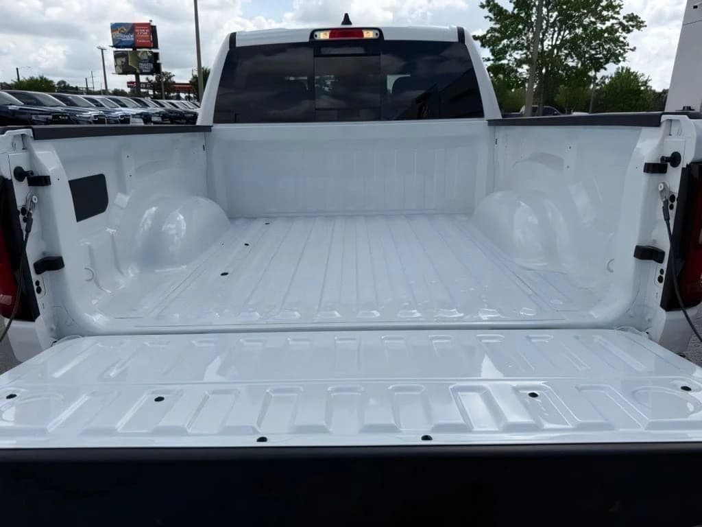 Ram 1500 Warlock 4x4 Crew Cab 5'7" Box 2026 — side view