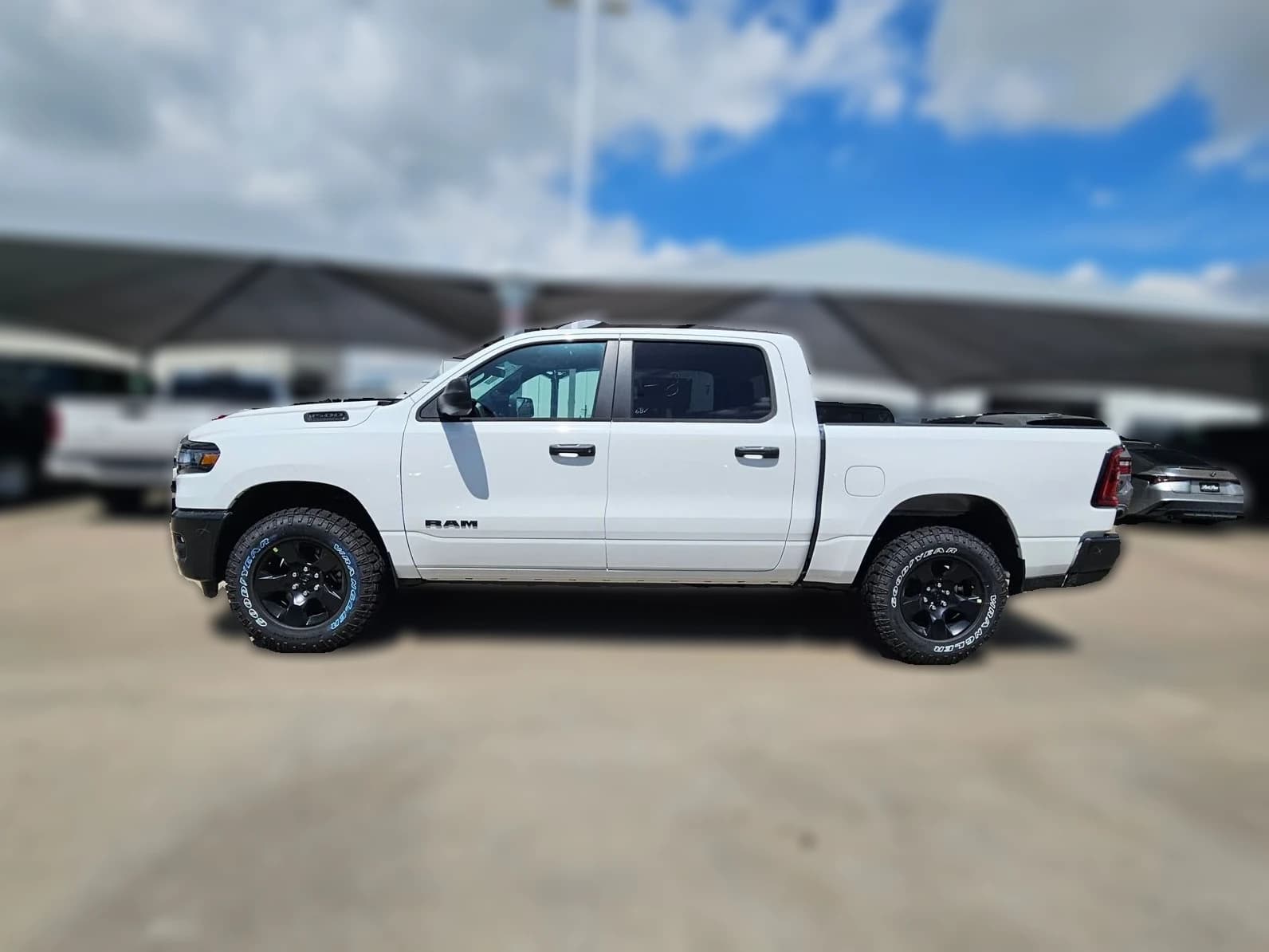 Ram 1500 Warlock 4x4 Crew Cab 5'7" Box 2026 — side view