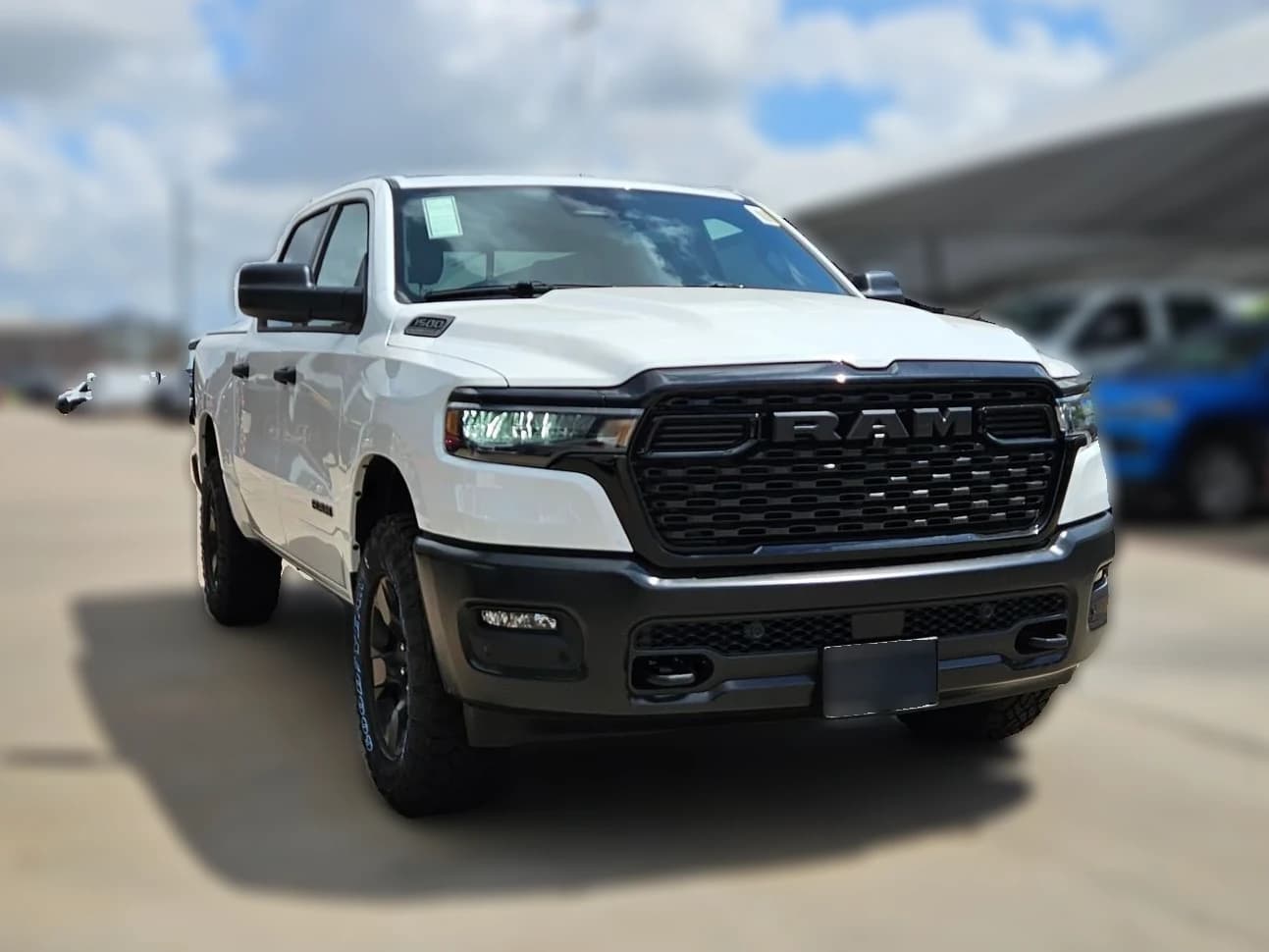 Ram 1500 Warlock 4x4 Crew Cab 5'7" Box 2026 — side view