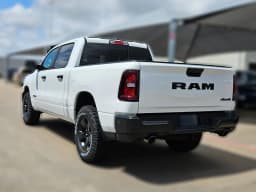 Ram 1500 Warlock 4x4 Crew Cab 5'7" Box 2026 — side view
