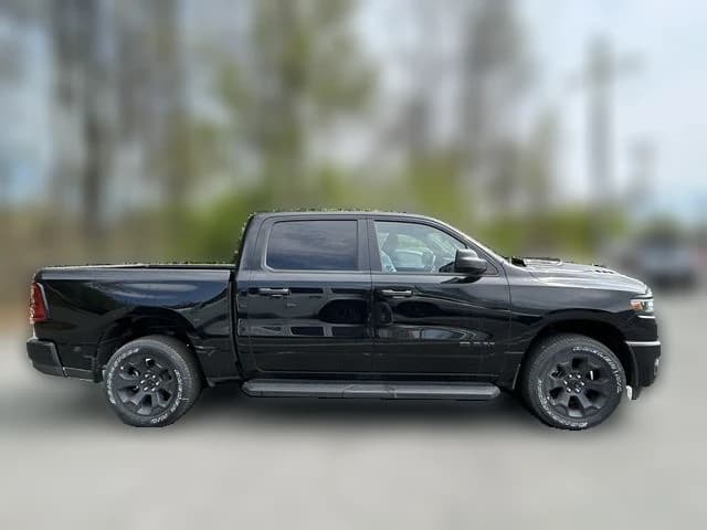 Ram 1500 Express 4x4 Crew Cab 5'7" Box 2026 — side view