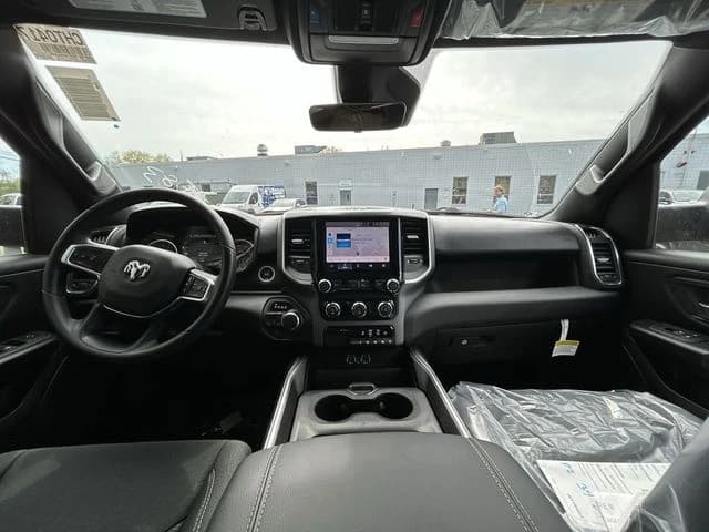 Ram 1500 Express 4x4 Crew Cab 5'7" Box 2026 — side view