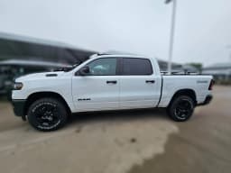 Ram 1500 Warlock 4x4 Crew Cab 5'7" Box 2026 — side view