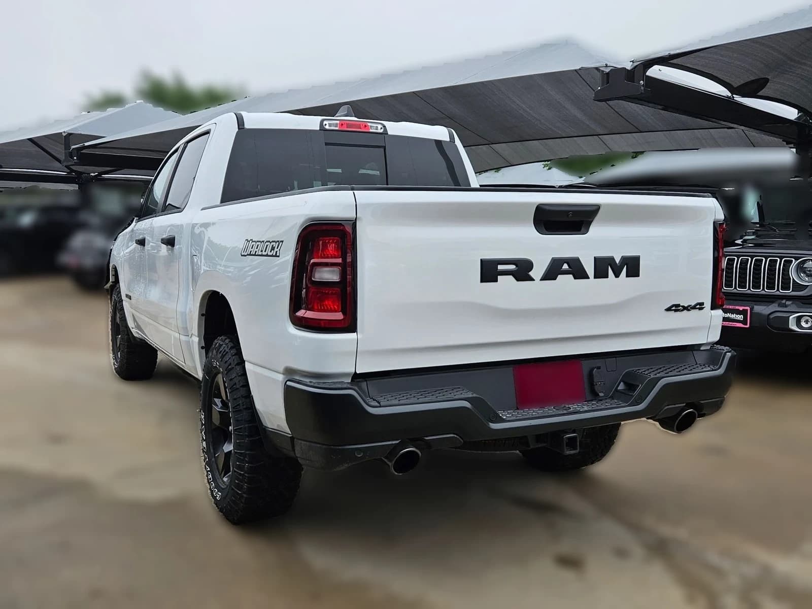 Ram 1500 Warlock 4x4 Crew Cab 5'7" Box 2026 — side view