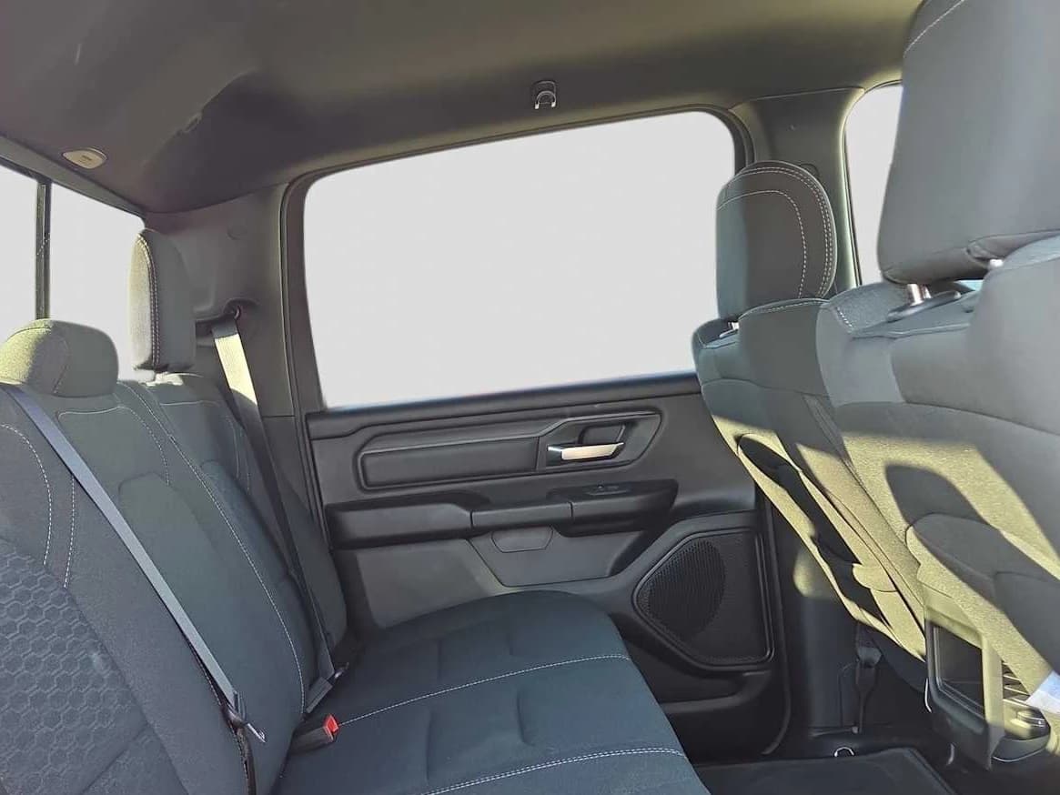Ram 1500 Express 4x4 Crew Cab 5'7" Box 2026 — side view