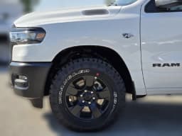 Ram 1500 Warlock 4x4 Crew Cab 5'7" Box 2026 — side view