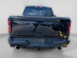 Ram 1500 Express 4x4 Crew Cab 5'7" Box 2026 — side view