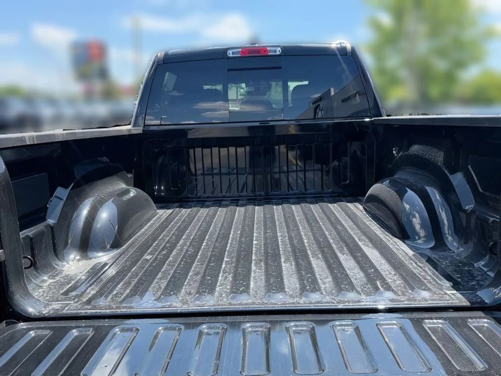 Ram 1500 Express 4x4 Crew Cab 5'7" Box 2026 — side view