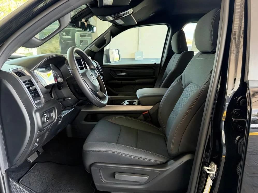Ram 1500 Express 4x4 Crew Cab 5'7" Box 2026 — side view