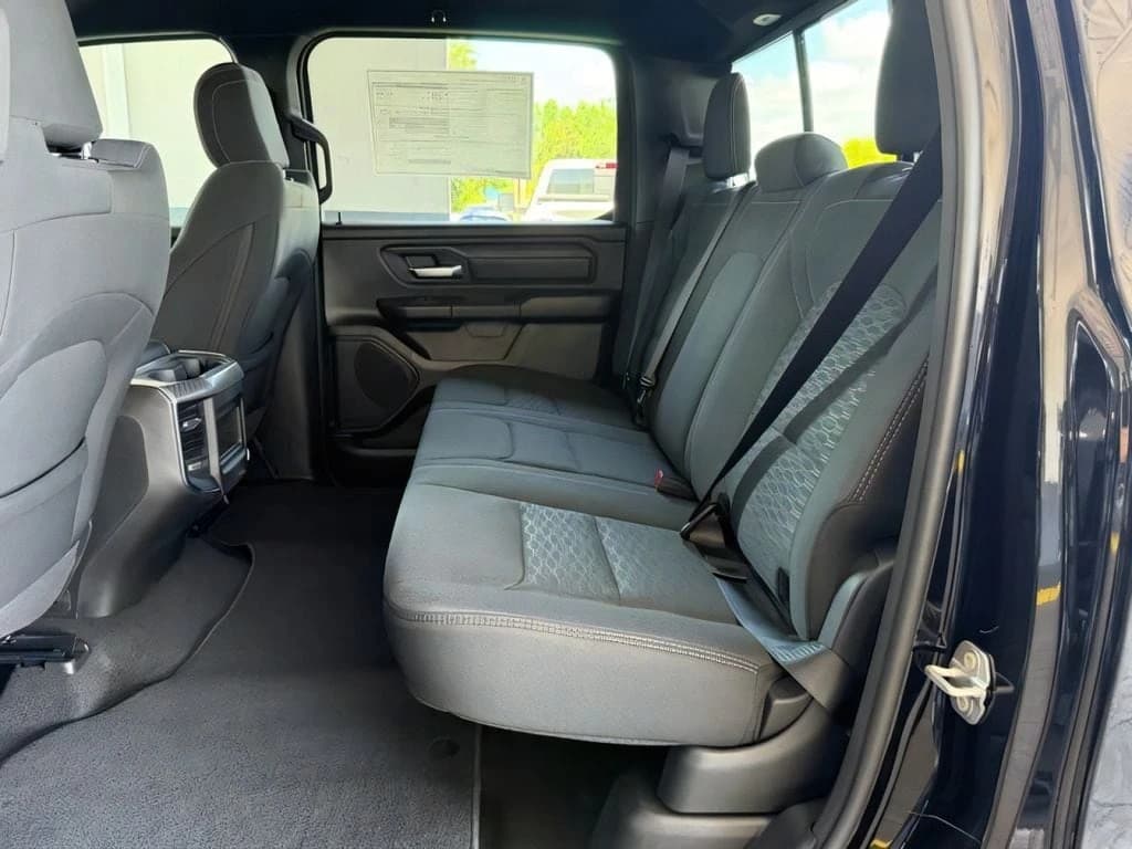 Ram 1500 Express 4x4 Crew Cab 5'7" Box 2026 — side view